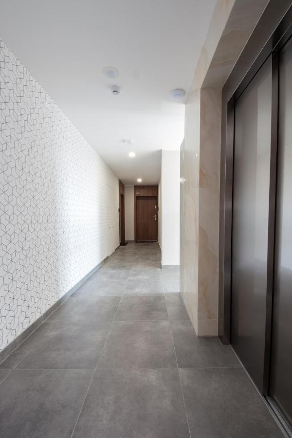 Apartament 23 Park City ออสทรุฟ วีแยลคอพพอลสกี ภายนอก รูปภาพ