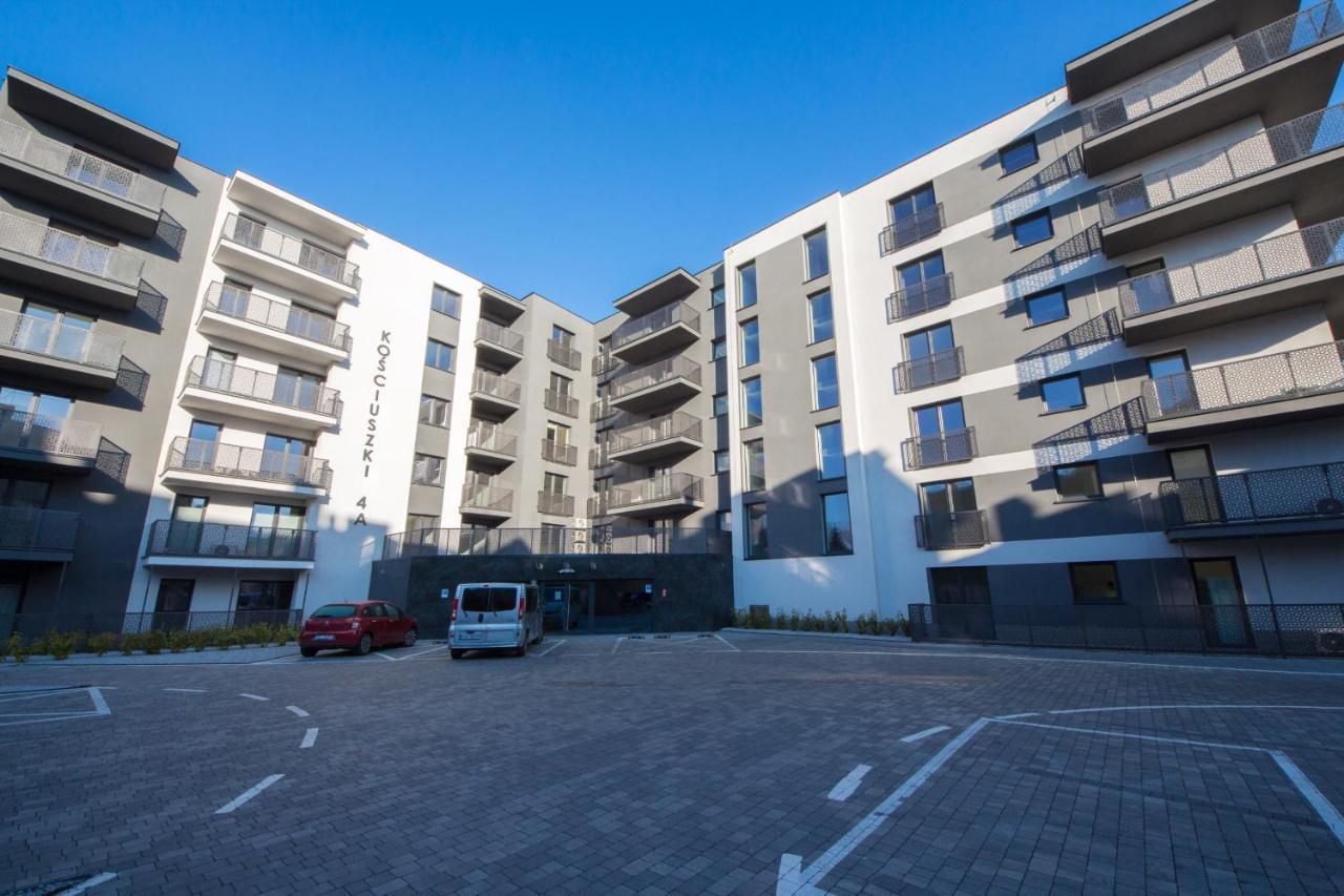 Apartament 23 Park City ออสทรุฟ วีแยลคอพพอลสกี ภายนอก รูปภาพ