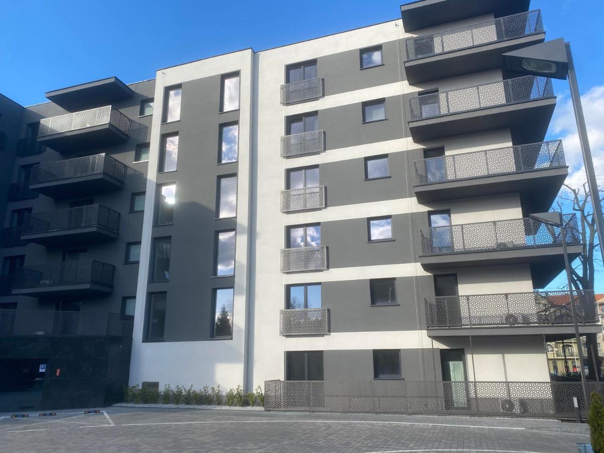 Apartament 23 Park City ออสทรุฟ วีแยลคอพพอลสกี ภายนอก รูปภาพ